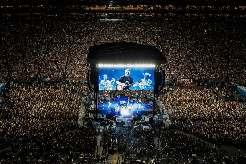 Zach Bryan performs to a sold-out crowd of over 112,000 people at Michigan Stadium in Ann Arbor on Saturday, Sept. 27, 2025.