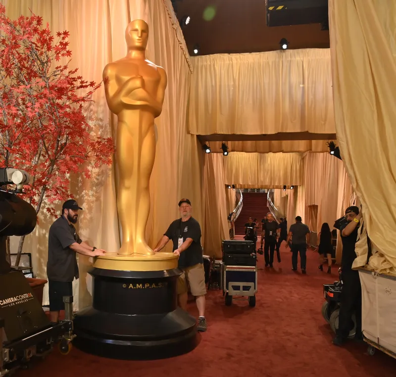 crew move a gian Oscar backstage at 2026 Academy awards