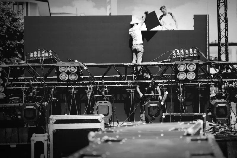 crew building a stage wall