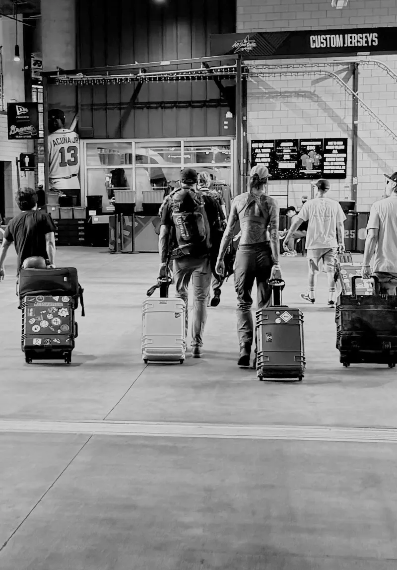 crew travelling with suitcases